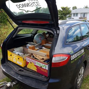 Car loaded with goods for auction