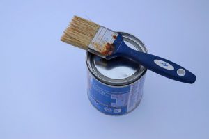 paint tin and brush